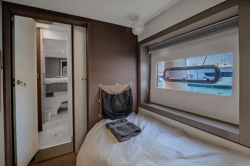 Cinders Yacht Photos Pics Cozy cabin interior of 2020 Bali 5.4 yacht with window view and modern amenities.