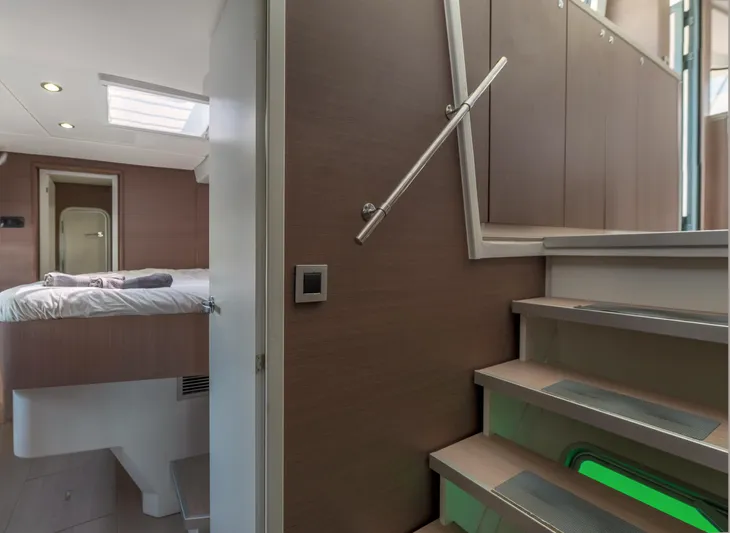 Cinders Yacht Photos Pics Interior of 2020 Bali 5.4 yacht showing stairs and bedroom with modern design.