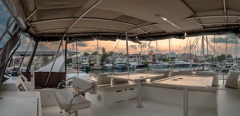 Cinders Yacht Photos Pics Luxurious Bali 5.4 yacht interior with marina view at sunset, 2020 model.