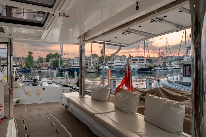 Cinders Yacht Photos Pics Luxurious Bali 5.4 yacht interior with marina view at sunset, 2020 model.