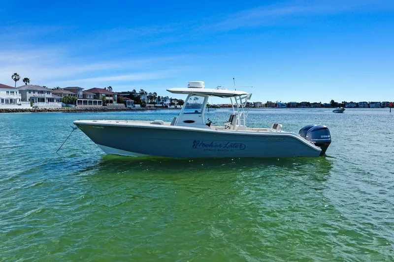  Yacht Photos Pics 2019 Cobia 301 Center Console boat on calm waters.