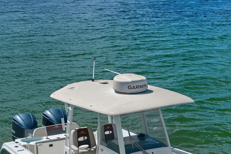  Yacht Photos Pics Cobia 301 Center Console boat on calm water, 2019 model.