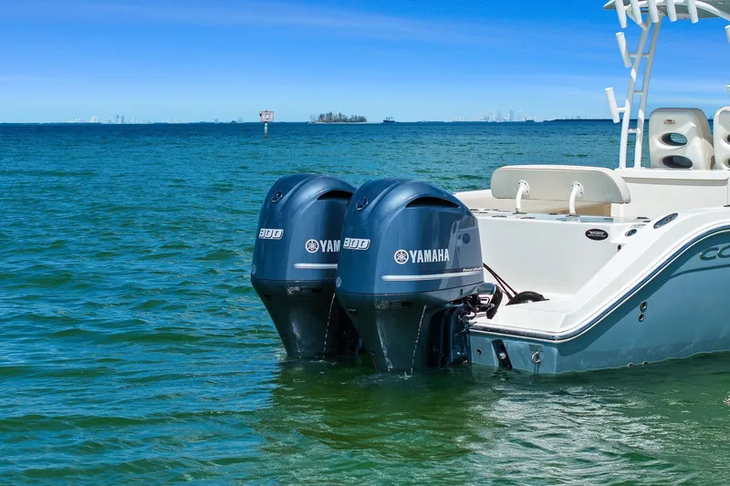  Yacht Photos Pics 2019 Cobia 301 Center Console with Yamaha engines on the water.