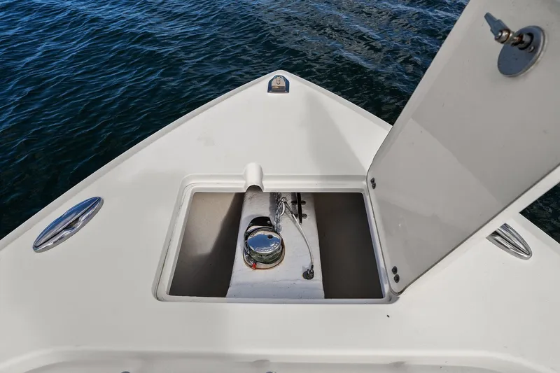  Yacht Photos Pics Cobia 301 Center Console 2019 anchor compartment on open water.