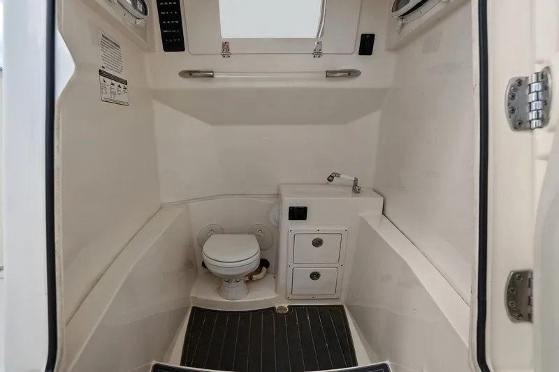  Yacht Photos Pics Interior of 2019 Cobia 301 Center Console with toilet.