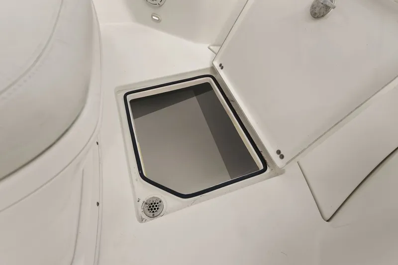  Yacht Photos Pics Open storage compartment on a 2019 Cobia 301 Center Console boat.