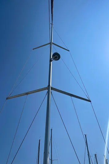  Yacht Photos Pics Mast of 2017 Hanse 455 sailboat against clear blue sky.