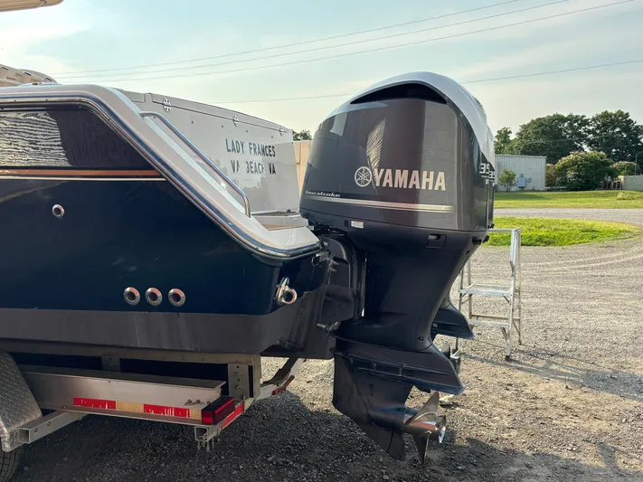 H Lady Frances Yacht Photos Pics 2011 Grady-White Canyon 336 boat with Yamaha outboard motor, parked on a trailer.