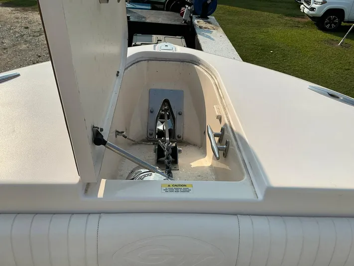 H Lady Frances Yacht Photos Pics 2011 Grady-White Canyon 336 anchor compartment, open lid, showing anchor and mechanism.