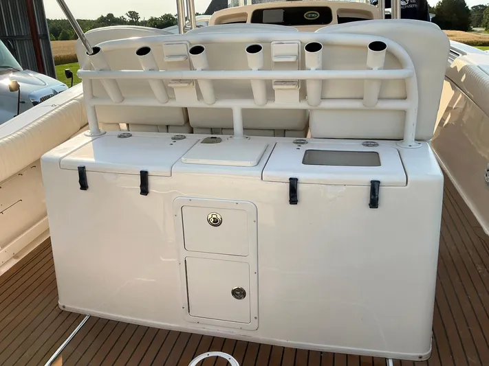 H Lady Frances Yacht Photos Pics 2011 Grady-White Canyon 336 boat deck with storage compartments and rod holders.