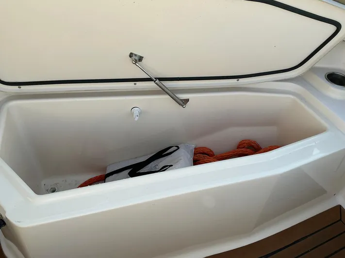 H Lady Frances Yacht Photos Pics Open storage compartment on 2011 Grady-White Canyon 336 boat with rope inside.
