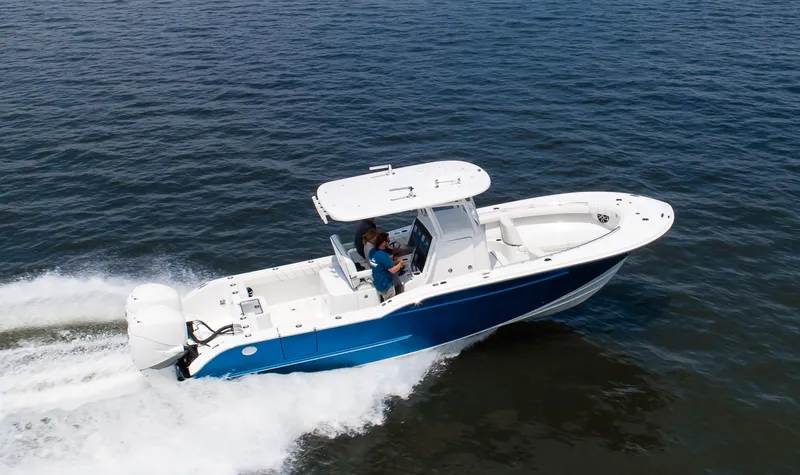  Yacht Photos Pics 2025 Buddy Davis 28 Center Console boat cruising on open water.