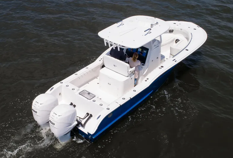  Yacht Photos Pics 2025 Buddy Davis 28 Center Console boat cruising on open water.