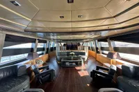 Luxurious interior of 2011 AB 140 yacht with elegant seating and panoramic windows.