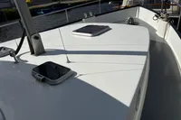 Custom Belter 1240 boat deck, 2002 model, featuring sleek design and modern fittings.