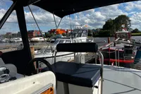 Boats docked at a marina, view from a Custom Belter 1240, 2002 model.