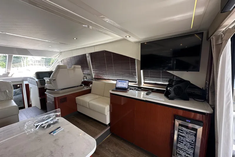  Yacht Photos Pics Luxurious interior of 2017 Sea Ray Fly 460 yacht with modern amenities and elegant design.
