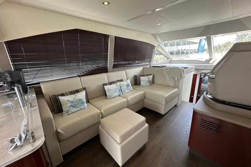  Yacht Photos Pics Luxurious interior of 2017 Sea Ray Fly 460 yacht with plush seating and elegant decor.