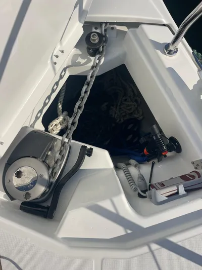  Yacht Photos Pics Anchor locker of 2024 Jeanneau Sun Odyssey 380 sailboat with chain and equipment.