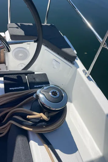  Yacht Photos Pics 2024 Jeanneau Sun Odyssey 380 cockpit with steering wheel and winch.