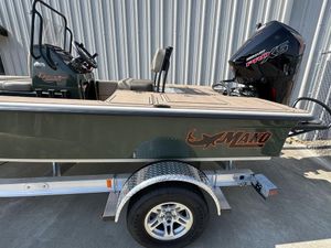 2025 Mako Pro Skiff 18 Backwater Edition on trailer, side view.