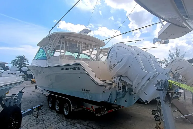 375-712 Used Yacht Photos Pics 2021 Grady-White Freedom 375 boat on trailer, featuring dual outboard engines.