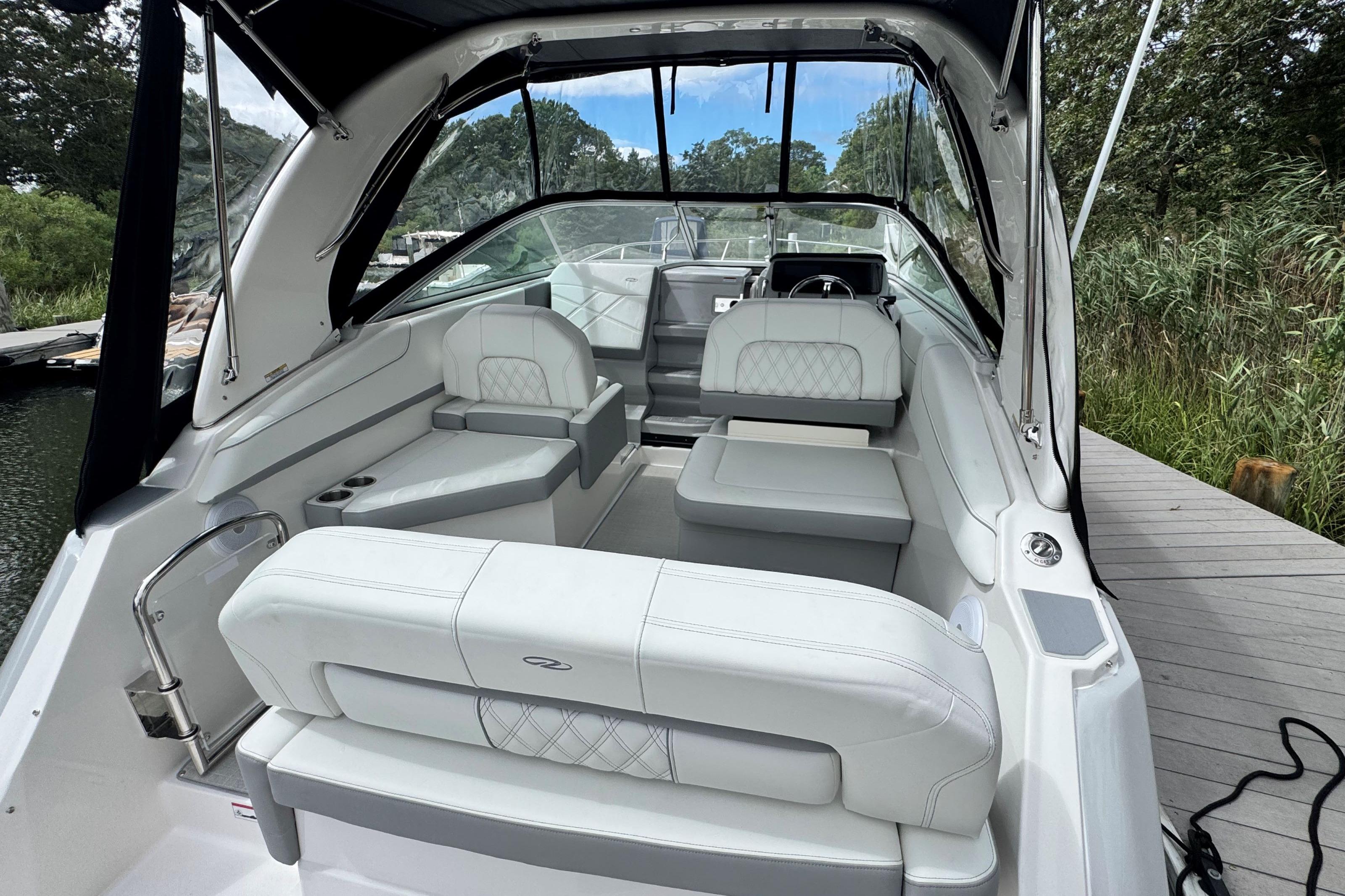 Luxurious interior of 2026 Regal 26 XO boat with plush seating and modern design.