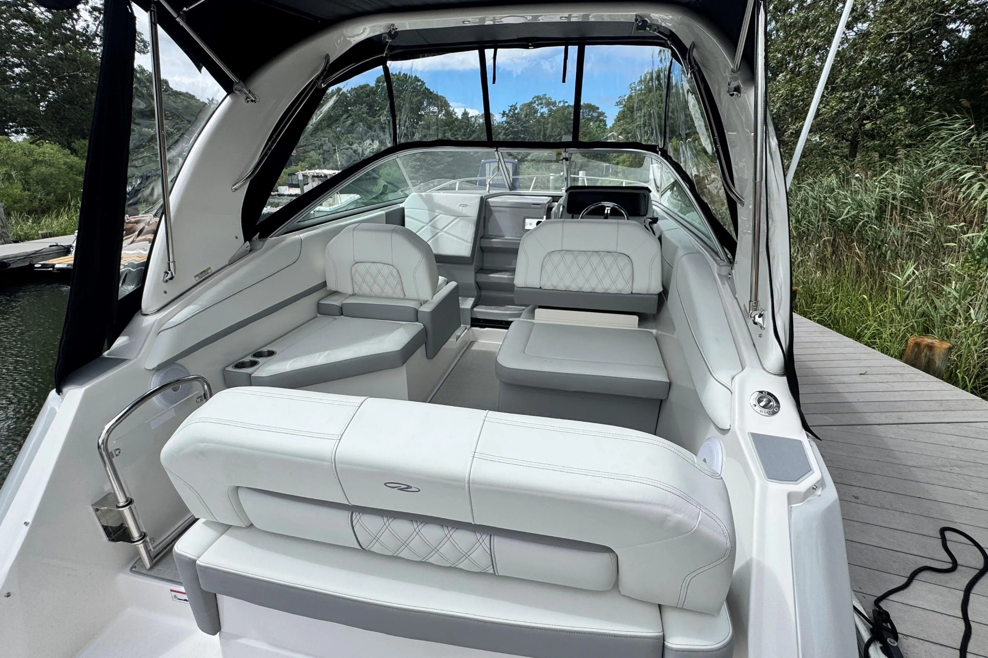 Luxurious interior of 2026 Regal 26 XO boat with plush seating and modern design.