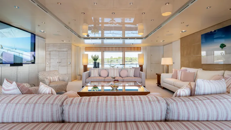 Loon Yacht Photos Pics Luxurious interior of 2010 Icon Full Displacement Motoryacht with elegant seating and large windows.