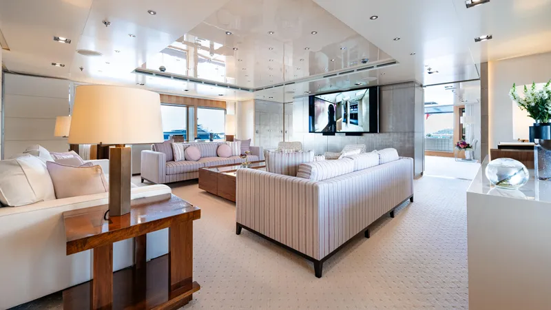 Loon Yacht Photos Pics Luxurious interior of 2010 Icon Full Displacement Motoryacht with modern furnishings and ample seating.