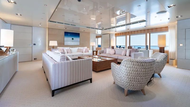 Loon Yacht Photos Pics Luxurious interior of 2010 Icon Full Displacement Motoryacht with modern furnishings and large windows.