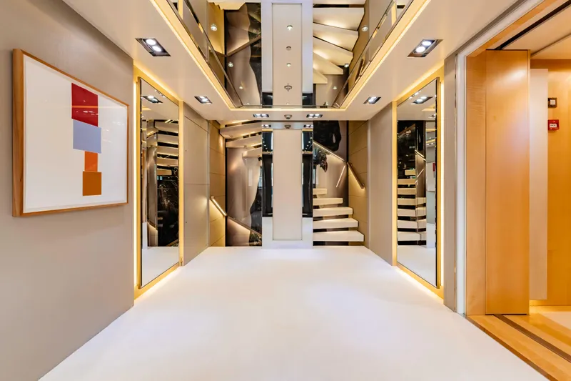 Loon Yacht Photos Pics Luxurious interior of 2010 Icon Full Displacement Motoryacht with modern art and mirrored walls.