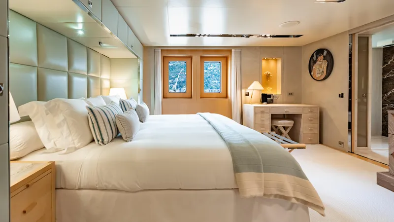 Loon Yacht Photos Pics Luxurious bedroom in a 2010 Icon Full Displacement Motoryacht with elegant decor.