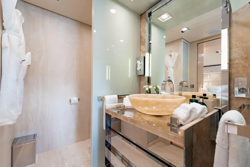 Loon Yacht Photos Pics Luxurious bathroom on a 2010 Icon Full Displacement Motoryacht with modern fixtures and elegant design.