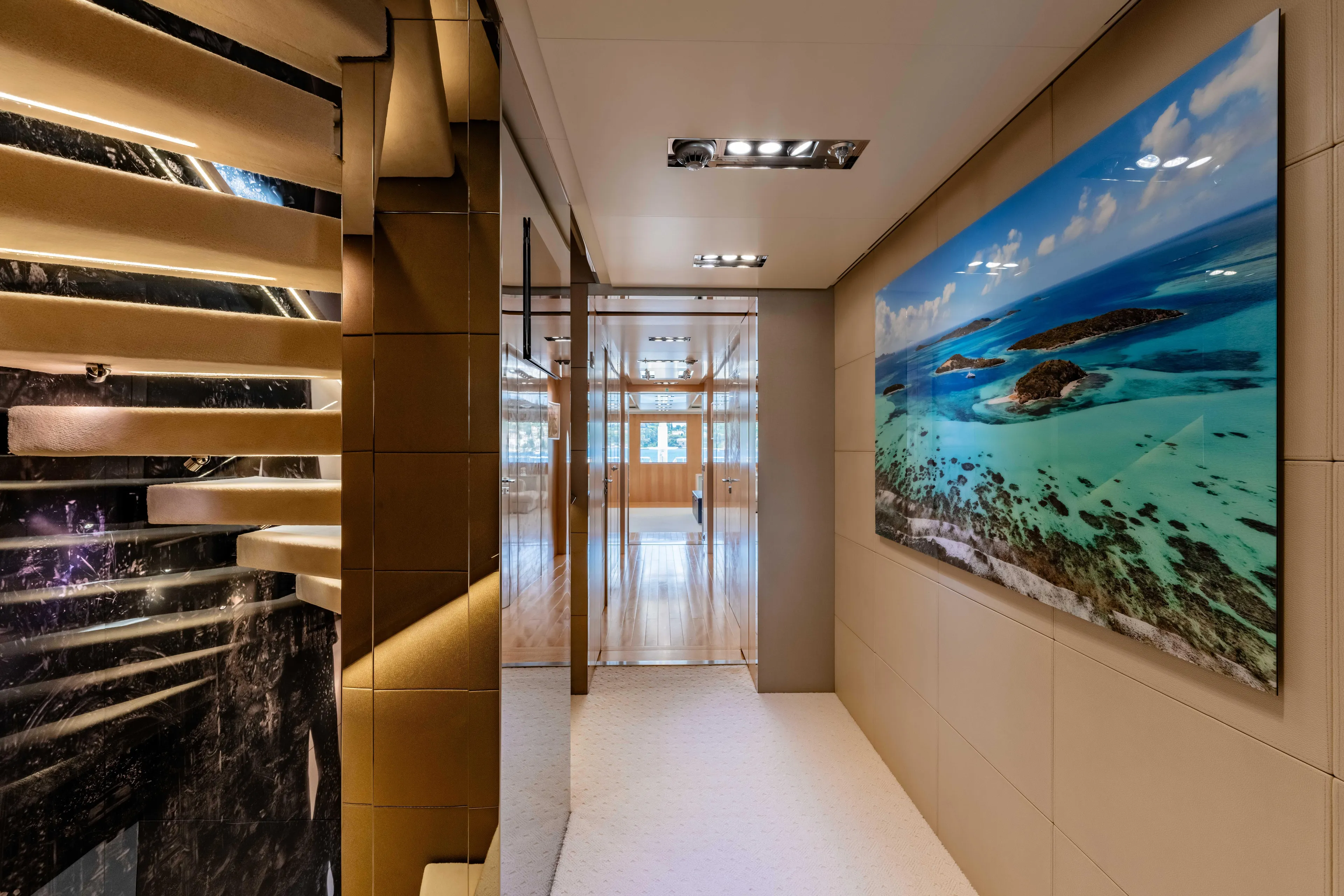 Loon Yacht Photos Pics Luxurious interior of 2010 Icon Full Displacement Motoryacht with modern decor and ocean artwork.