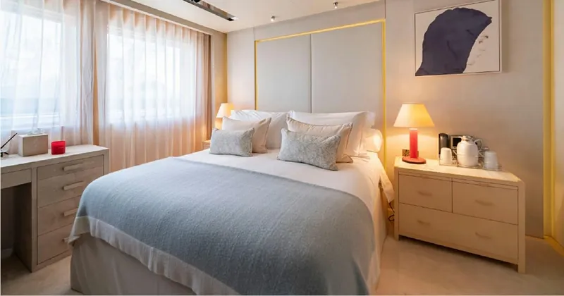 Loon Yacht Photos Pics Luxurious bedroom on a 2010 Icon Full Displacement Motoryacht with modern decor.