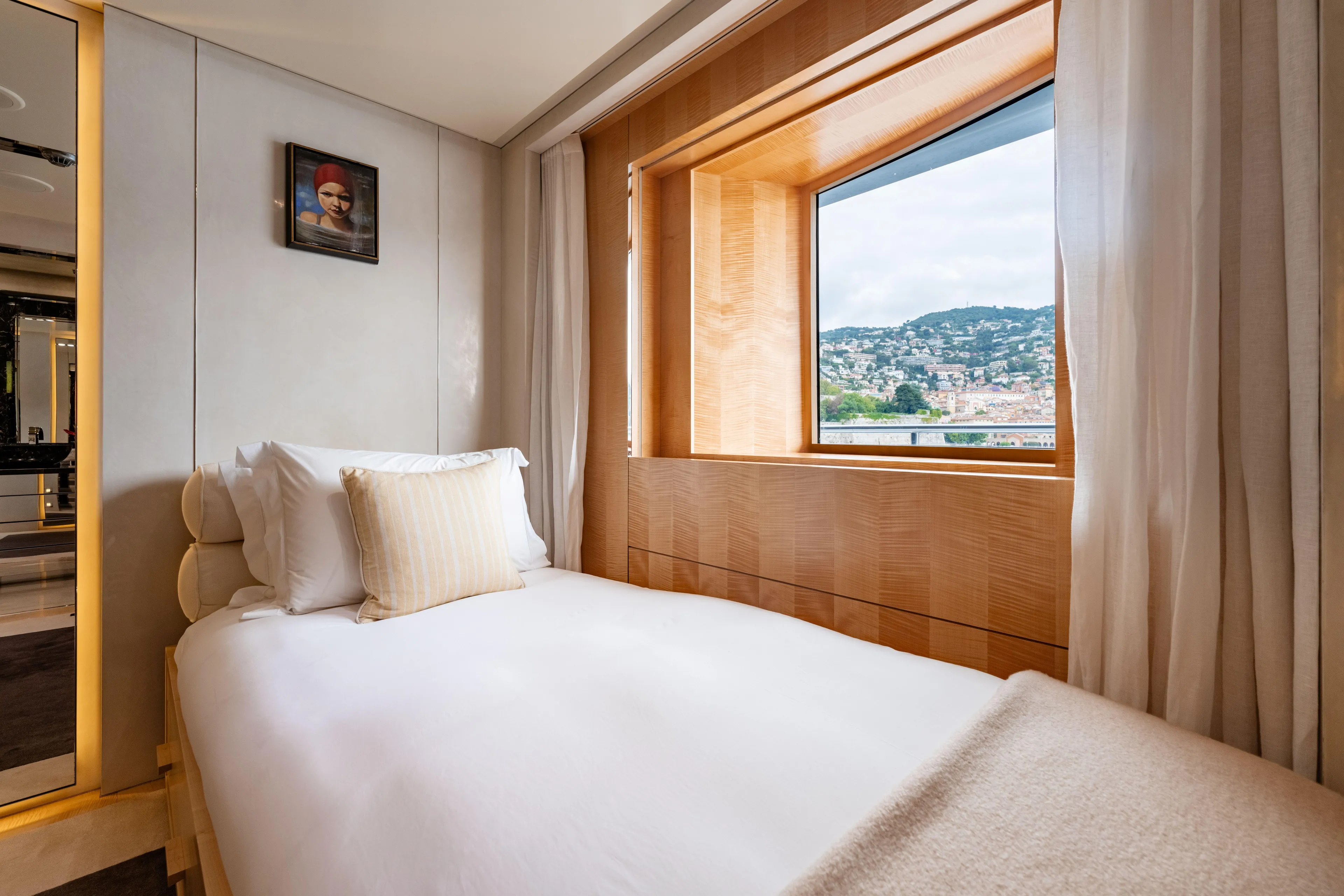 Loon Yacht Photos Pics Luxurious bedroom on a 2010 Icon Full Displacement Motoryacht with scenic window view.