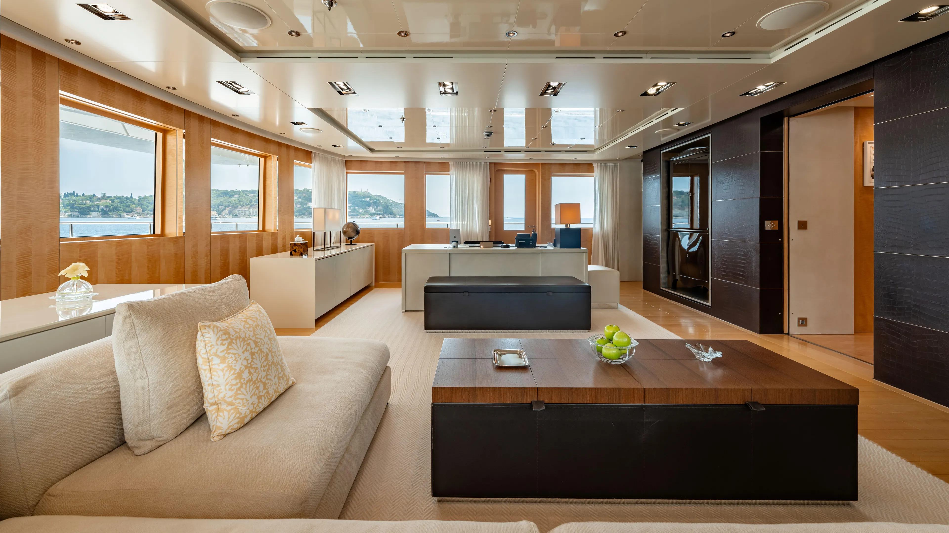 Loon Yacht Photos Pics Luxurious interior of 2010 Icon Full Displacement Motoryacht with modern furnishings and large windows.