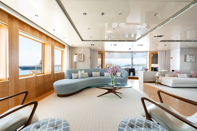 Loon Yacht Photos Pics Luxurious interior of 2010 Icon Full Displacement Motoryacht with modern furnishings and large windows.