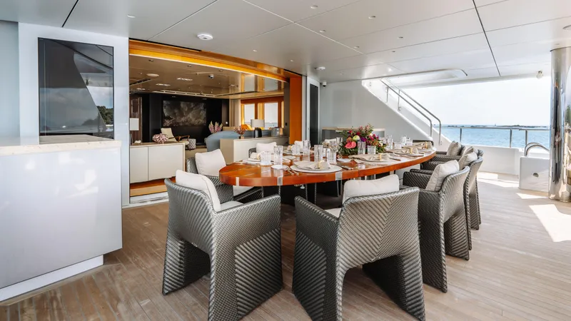 Loon Yacht Photos Pics Luxurious dining area on 2010 Icon Full Displacement Motoryacht with ocean view.