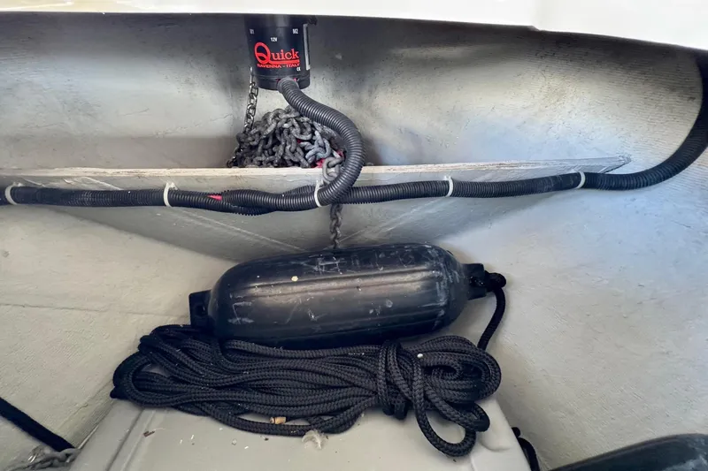 Tui Yacht Photos Pics Anchor chain and fender storage in 2005 Back Cove 29 boat compartment.