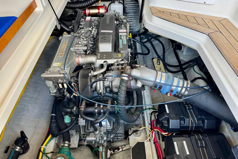 Tui Yacht Photos Pics Engine compartment of a 2005 Back Cove 29 boat, featuring a Yanmar engine.