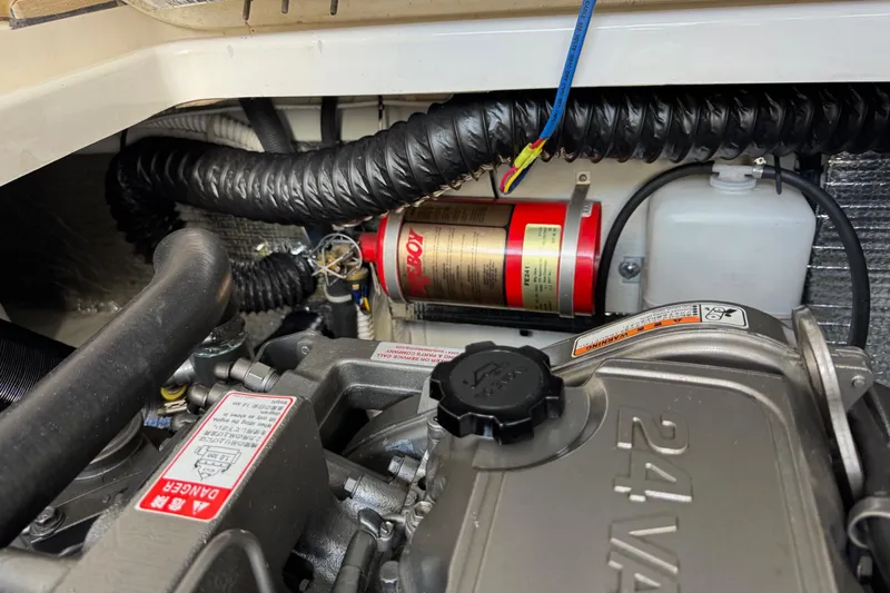 Tui Yacht Photos Pics Engine compartment of a 2005 Back Cove 29 boat, featuring detailed components and wiring.