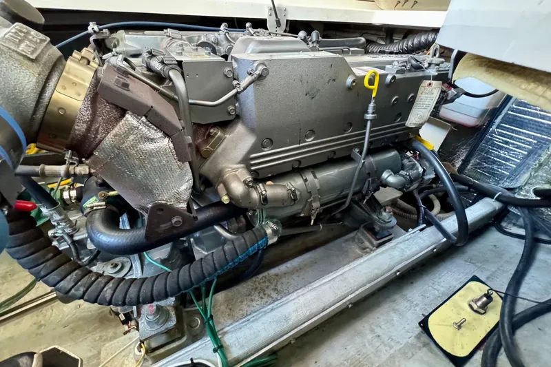 Tui Yacht Photos Pics Engine compartment of a 2005 Back Cove 29 boat, showcasing detailed mechanical components.