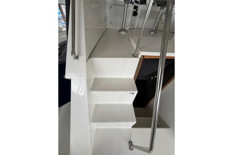  Yacht Photos Pics Staircase on 1994 Tollycraft 45 Cockpit Motor Yacht with stainless steel railings.