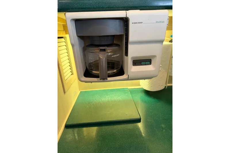  Yacht Photos Pics Built-in coffee maker on 1994 Tollycraft 45 Cockpit Motor Yacht kitchen counter.