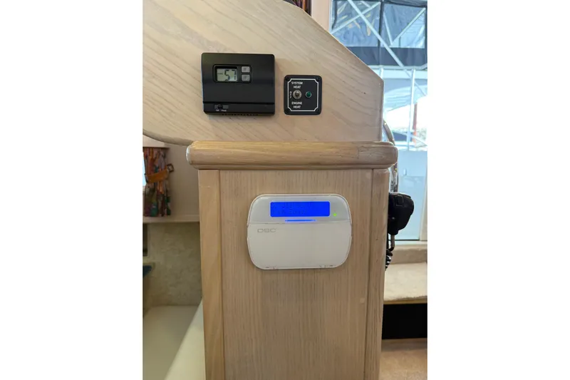  Yacht Photos Pics Control panel inside 1994 Tollycraft 45 Cockpit Motor Yacht, featuring digital display and system controls.