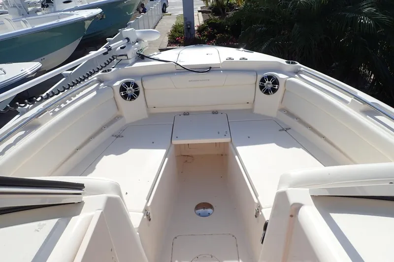  Yacht Photos Pics 2021 Grady-White Freedom 285 boat interior with seating and speakers.