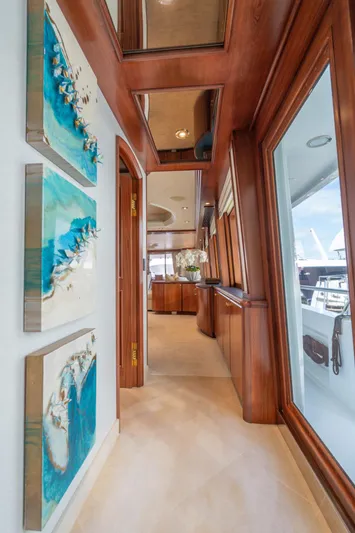 Risk And Reward Yacht Photos Pics Luxurious hallway in 2004 Crescent Raised Pilothouse yacht with elegant wood finishes.