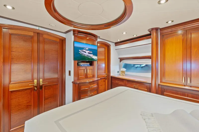 Risk And Reward Yacht Photos Pics Luxurious 2004 Crescent Raised Pilothouse yacht bedroom with elegant wood finishes and modern amenities.
